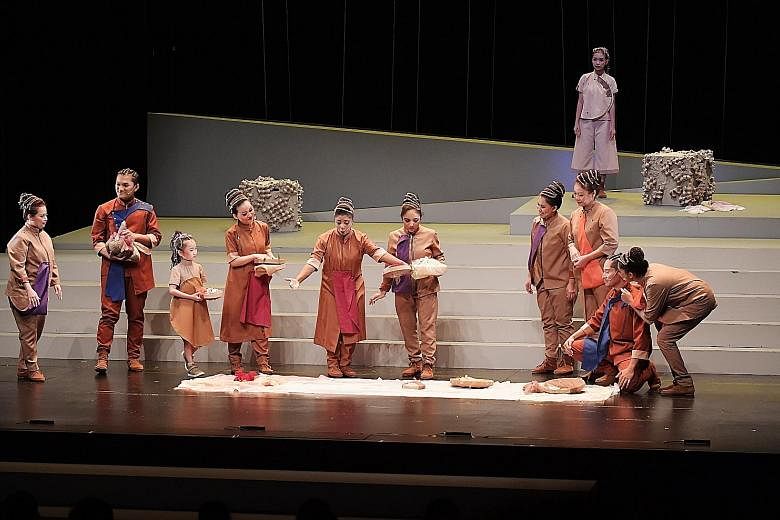 A performance by Singaporeans and new immigrants at the Victoria Theatre yesterday. It was jointly organised by the People's Association Integration Council and the National Integration Council to promote greater integration.