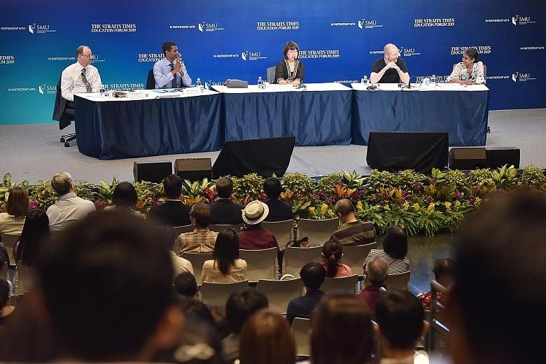 The panel at The Straits Times Education Forum consists of (from left) Singapore Management University (SMU) provost Timothy Clark, SMU associate professor of strategic management Reddi Kotha, ST opinion editor and debate moderator Chua Mui Hoong, an