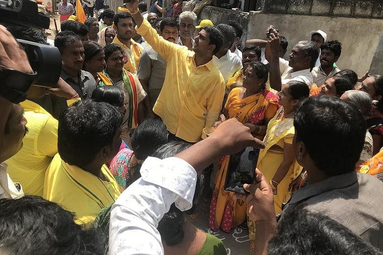 Above: Building works in Amaravati are in various stages of completion. Left: Andhra Pradesh Chief Minister Chandrababu Naidu's son, Mr Nara Lokesh, is contesting in Mangalagiri town for the Telugu Desam Party in Thursday's state assembly elections.