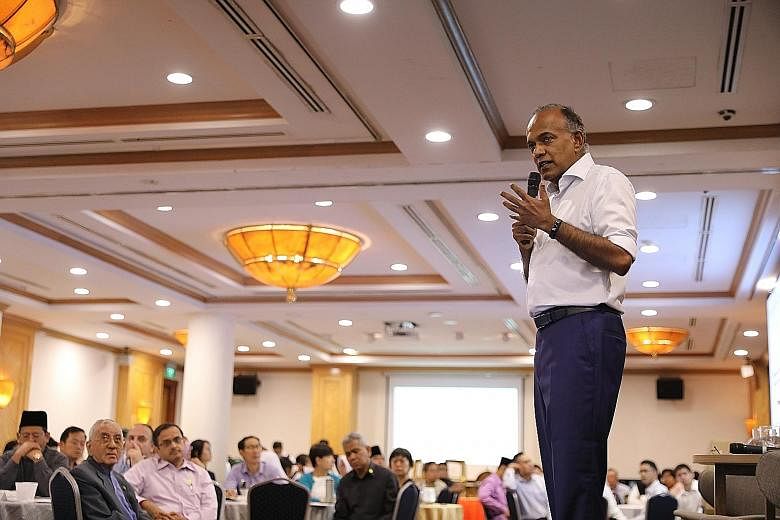 Law and Home Affairs Minister K. Shanmugam speaking at an event organised by the Association of Muslim Lawyers and social enterprise Wise SG yesterday to discuss hate speech and deliberate online falsehoods.
