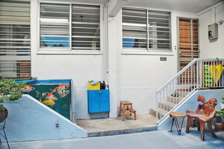 A flat owner who had converted his property's doorstep into a fish tank (above) for his koi carp has failed in his appeal to keep the structure. Tampines GRC MP Baey Yam Keng told ST that HDB and Tampines Town Council are exploring a plan to install 