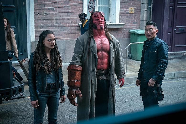 Hellboy stars (from left) Sasha Lane, David Harbour and Daniel Dae Kim.