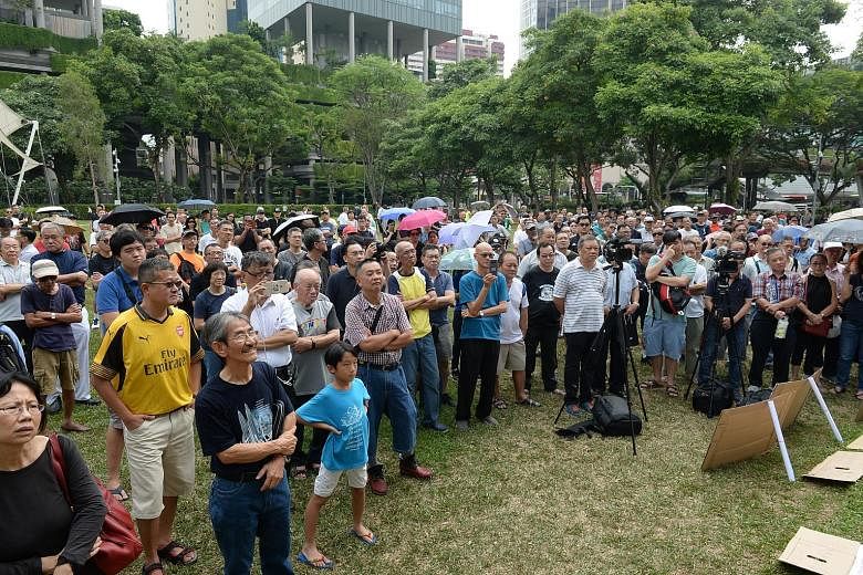 People at a protest against Hyflux's debt restructuring plan at Speakers' Corner last month. The water treatment company had $2.95 billion in liabilities as of March 31 last year. Unsecured investors stand to lose everything if the company is liquida