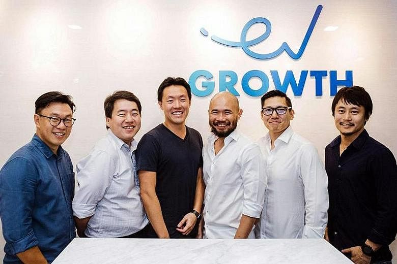 ShopBack chief executive officer Henry Chan (third from left) with the EV Growth team: (from left) managing partners Willson Cuaca and Roderick Purwana, adviser Batara Eto, managing partner Shinichiro Hori and vice-president of investment Yoshi Okubo
