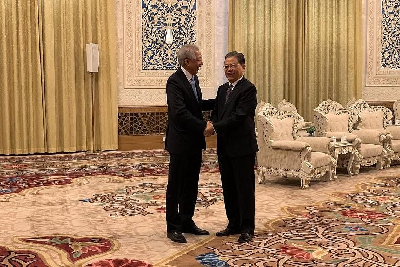 Deputy Prime Minister Teo Chee Hean (far left) meeting China's sixth-ranked leader Zhao Leji yesterday at Beijing's Great Hall of the People. He told Mr Zhao that he has brought a delegation of both familiar and new faces to strengthen bilateral rela