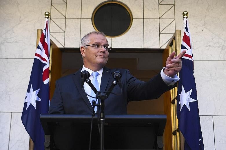 Australian Prime Minister Scott Morrison called the election just a week after delivering a federal budget that promised to return a surplus next year - for the first time in more than a decade. PHOTO: EPA-EFE
