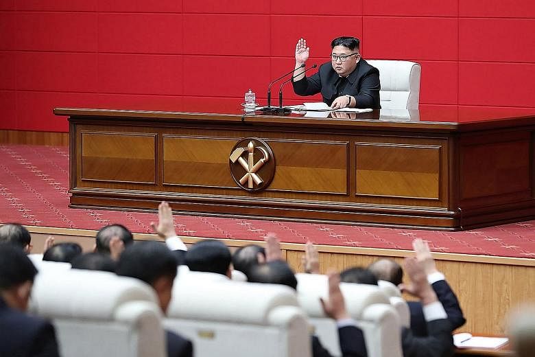 North Korean leader Kim Jong Un at the 4th Plenary Meeting of the 7th Central Committee of the Workers' Party of Korea in Pyongyang on Wednesday. PHOTO: AGENCE FRANCE-PRESSE