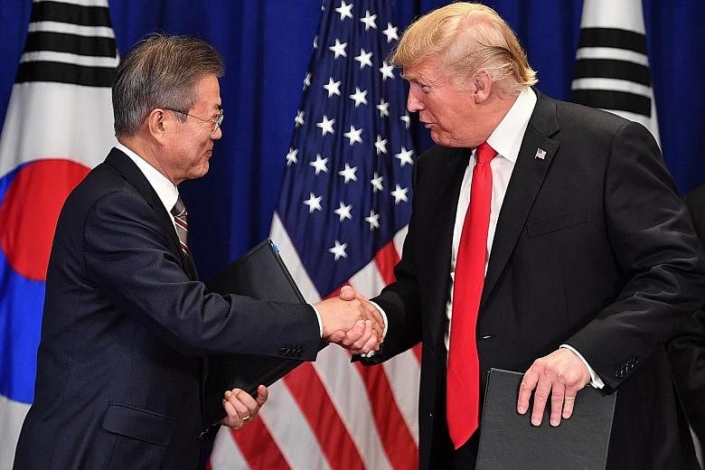 South Korean President Moon Jae-in and his United States counterpart Donald Trump, seen here in a meeting in New York last year, were slated to meet at the White House yesterday. PHOTO: AGENCE FRANCE-PRESSE