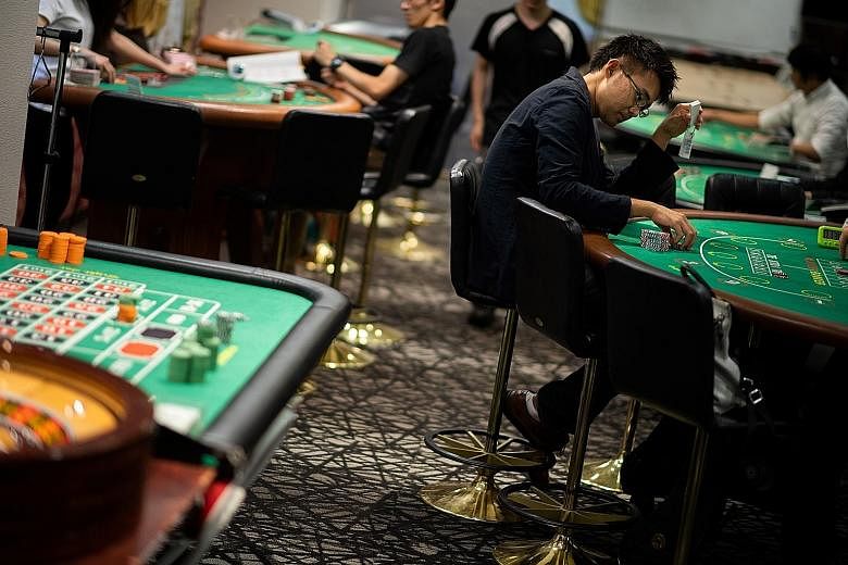 Students practising at the Japan Casino School (above) in Tokyo. Japan, which has allowed three integrated resorts (IRs) to be built, hopes to mitigate the risks of problem gambling while reaping the benefits of tourism spending and job creation. But