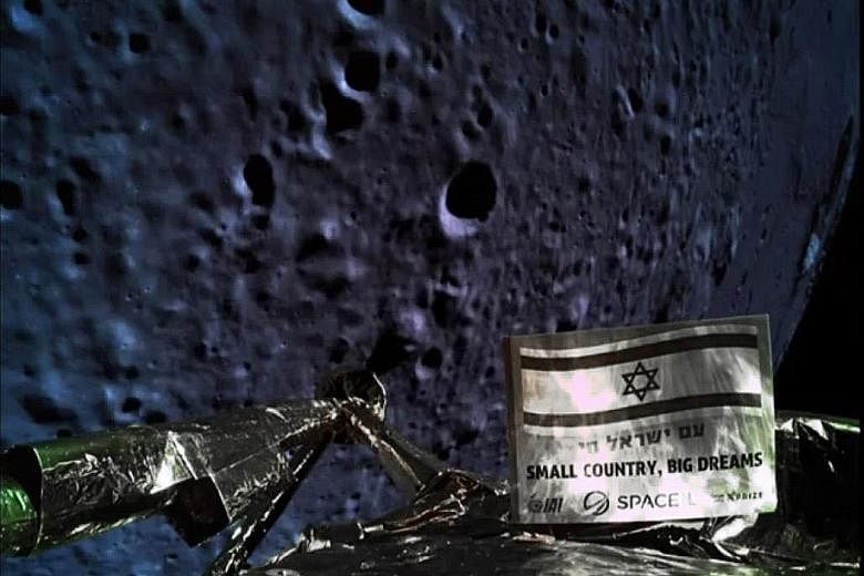 A handout picture released by SpaceIL and Israel Aerospace Industries on April 11 and taken by the camera of the spacecraft, of the Moon's surface as the spacecraft approaches and before it crashed during the landing.