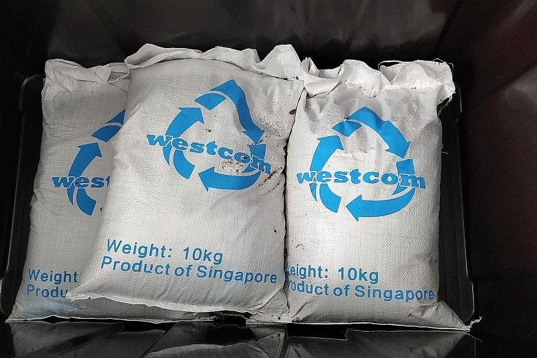 Bags of fertiliser produced by Westcom's food waste recycling machine.