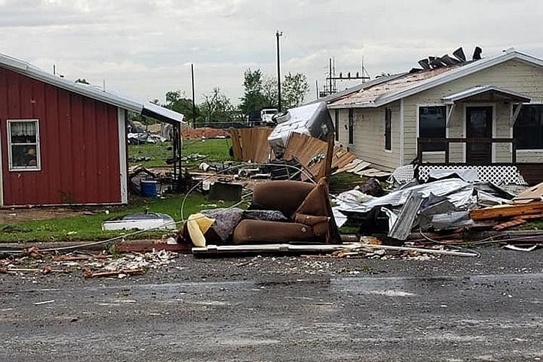 The aftermath of a tornado in Franklin, Texas, last Saturday. The storm system picked up strength in the southern US over the weekend, where it spurred tornadoes that killed at least five people, including three children, officials said.