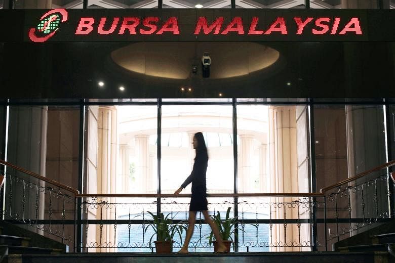 Bursa Malaysia's headquarters in Kuala Lumpur. According to data compiled by Bloomberg, foreign investors have dumped Malaysian shares worth more than a net US$500 million (S$677 million) so far this year.