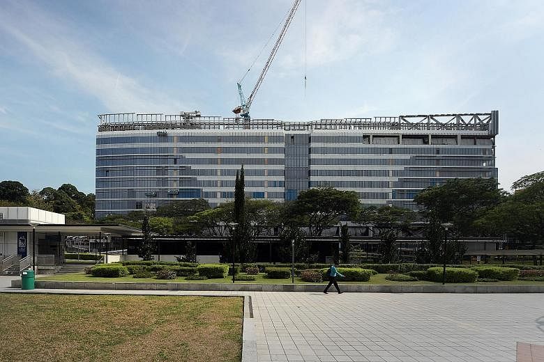 UBS Singapore will take up 381,000 sq ft of net lettable area at the redeveloped Park Mall building, spanning eight levels across two towers. It plans to move into the 10-storey Grade A office building in the second half of next year.