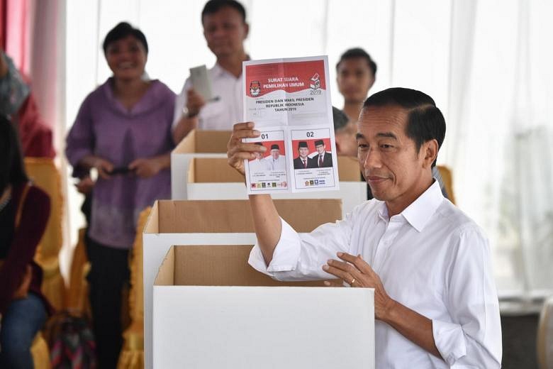 Early quick count tallies point to Joko victory in Indonesia elections ...