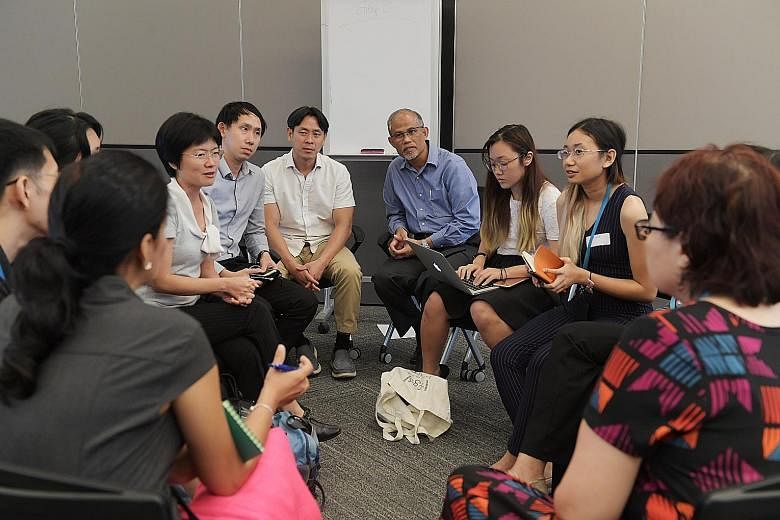 The Ministry of the Environment and Water Resources, in partnership with Zero Waste Singapore and LepakInSG, holding a focus group discussion at the Environment Building yesterday, with Minister Masagos Zulkifli and MP Louis Ng in attendance.