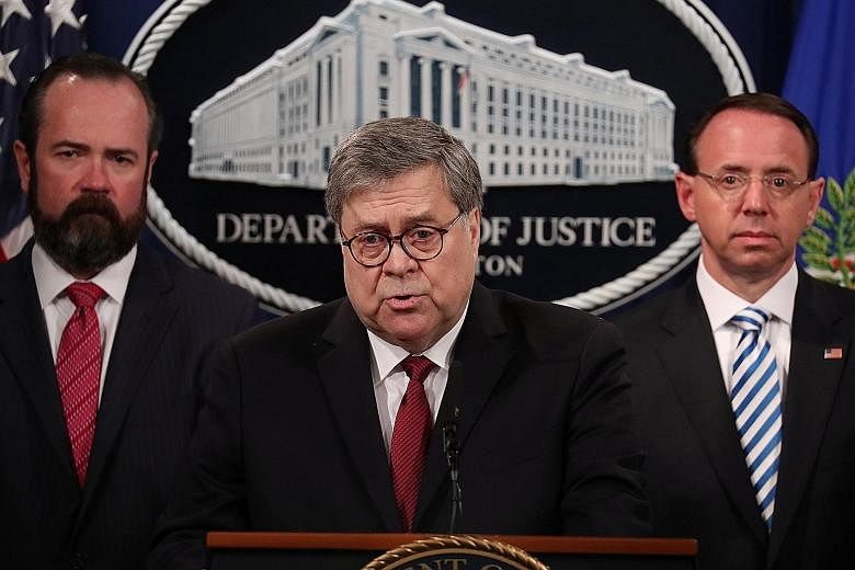 US Attorney-General William Barr speaking at a news conference yesterday, where he noted that he and Deputy Attorney-General Rod Rosenstein (at right) disagreed with some of Special Counsel Robert Mueller's "legal theories" about obstruction of justi
