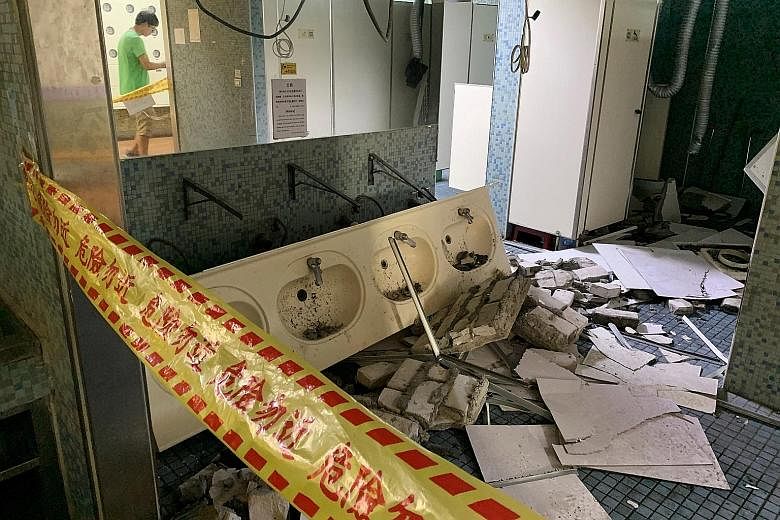 The damage in a university washroom in Taipei after an earthquake struck Taiwan's coastal city of Hualien yesterday.