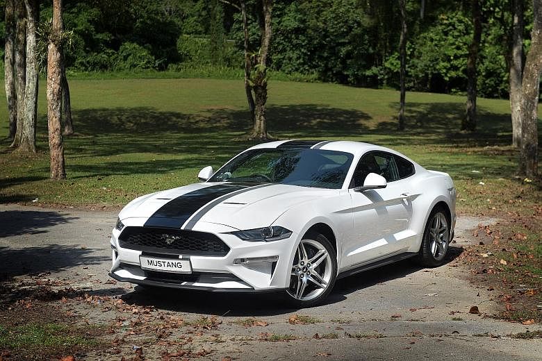The Ford Mustang comes with a retuned 2.3-litre turbo engine and is equipped with more tech, including adaptive cruise control, lane departure warning and collision mitigation.