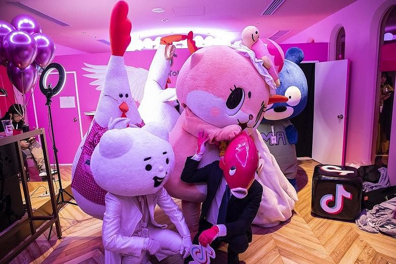 People dressed in costumes at a TikTok Creator's Lab event hosted by ByteDance in Tokyo in February. India banned TikTok, a popular video-sharing app, this week over concerns that it spread pornography and exposed children to sexual grooming.
