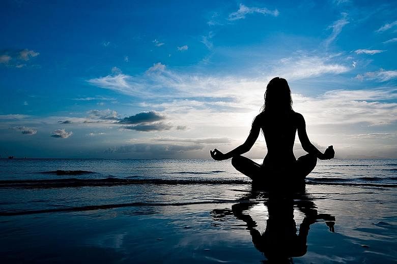 To achieve mental, spiritual and emotional wellness, millennials take up activities such as meditating.