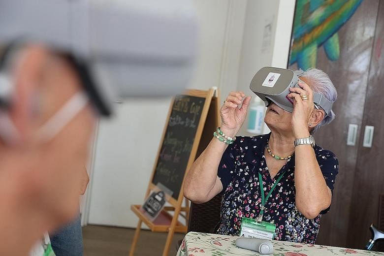 Senior citizens at St Luke's ElderCare Ayer Rajah Centre using virtual reality (VR) headsets. VR aids are said to improve the memory recall and attention span of dementia patients. They can also be used to help elderly residents with mobility constra