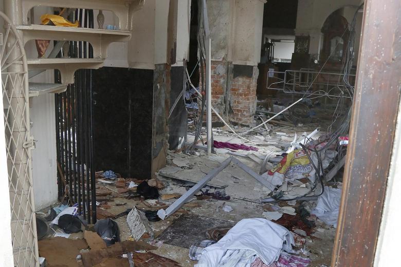 Debris is seen inside the damaged interior of St Anthony's Church in Kochchikade in Colombo, after the church was hit by an explosion on April 21, 2019.