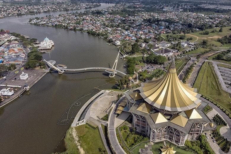 The gold umbrella roof of the New Sarawak State Legislative Assembly Building is an iconic landmark in Kuching and located on the north bank of the Sarawak River. PHOTO: BERNAMA Sunset at the waterfront in Kota Kinabalu, Sabah. While the debate over 