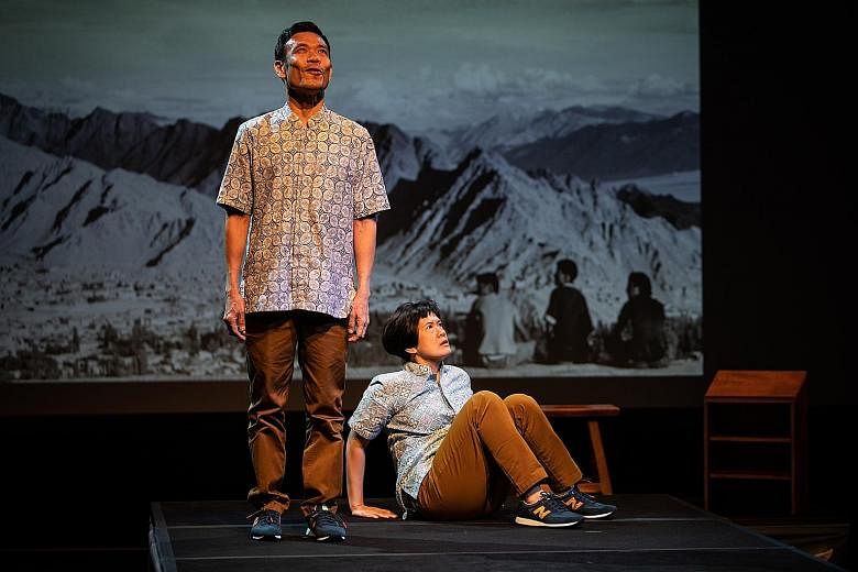 Loong Seng Onn (left) and Karen Tan perform in the English version of My Grandfather's Road.
