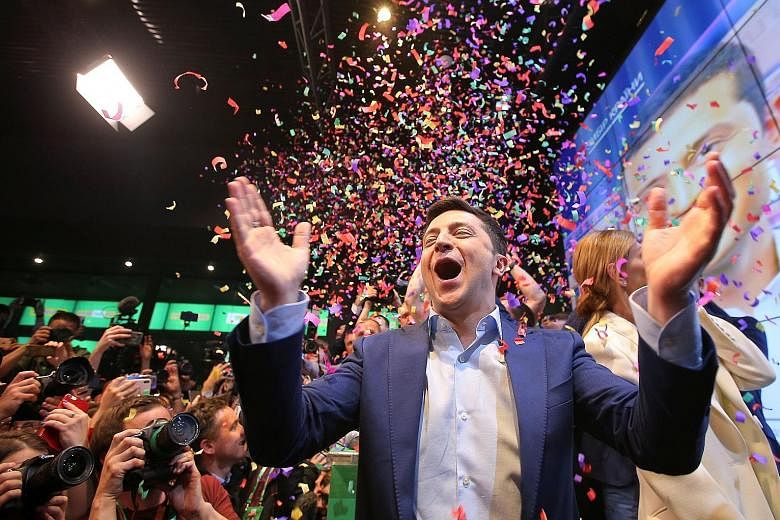 Ukrainian presidential candidate Volodymyr Zelensky after the announcement of the first exit poll at his campaign headquarters in Kiev on Sunday. His victory is a bitter blow for incumbent Petro Poroshenko, who had cast himself as a bulwark against R