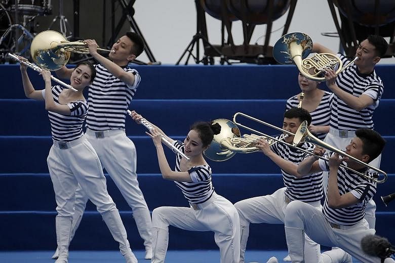 China's People's Liberation Army (PLA) Navy military band performing at the 70th anniversary celebration of the navy in Qingdao on Monday.