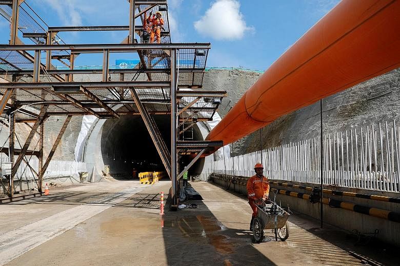 Employees working on the Wallini tunnel construction site for the Jakarta-Bandung High Speed Railway in West Bandung, West Java.