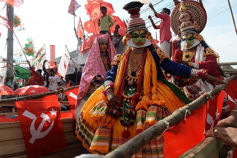 Indian Kathakali artists taking part in a rally with supporters of the Communist Party of India (Marxist) on Sunday, the final day of election campaigning in Pathanamthitta district in the south Indian state of Kerala.