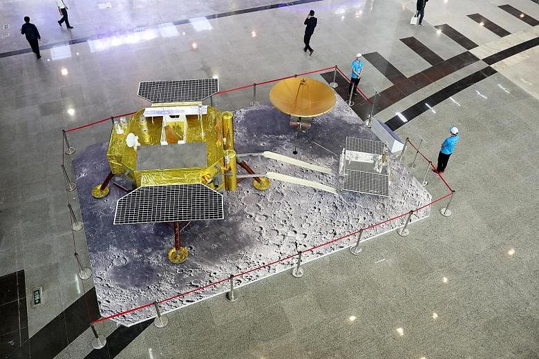 Models of the lunar rover Yutu 2, or Jade Rabbit 2, and the Chang'e 4 moon lander on show at an exhibition to mark China's Space Day 2019 yesterday in Changsha, Hunan province.