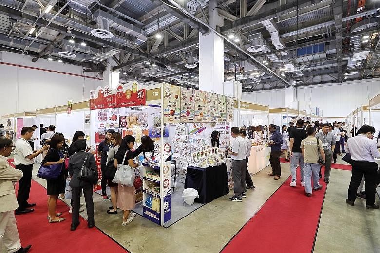 The inaugural Superfood Asia exhibition, which opened yesterday, is held at the Sands Expo and Convention Centre. The three-day event is open to trade visitors only and features over 80 exhibitors showcasing some 200 brands from across Asia. ST PHOTO