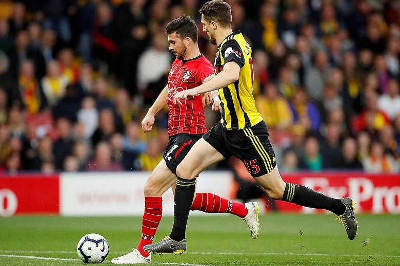 Southampton's Shane Long scoring his team's goal in the 1-1 Premier League draw at Watford on Tuesday. He beat the fastest league goal record set by Ledley King (9.82sec) in 2000.
