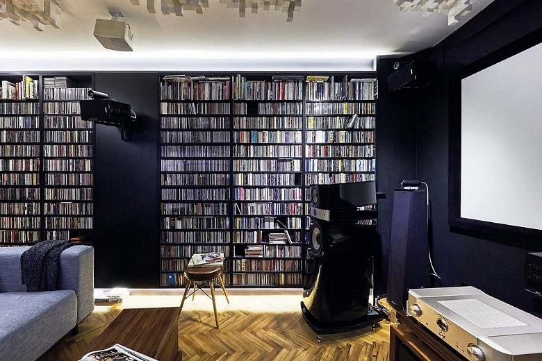 The entertainment room has two sound systems: one for movies and another for music.