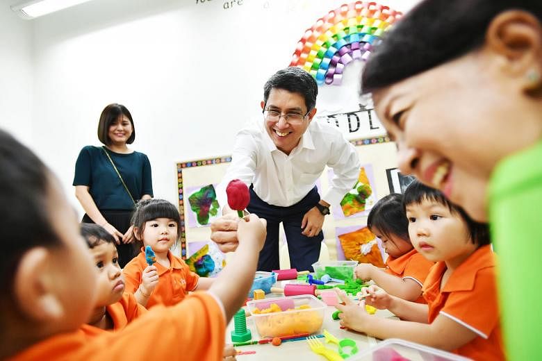 Senior Parliamentary Secretary for Social and Family Development and Education Muhammad Faishal Ibrahim interacting with children during a visit to a My First Skool branch in Yishun this week. For a start, M³'s collaboration with the Early Childhood