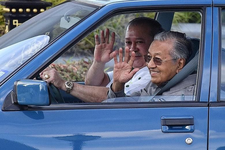Sultan Ibrahim Sultan Iskandar driving Prime Minister Mahathir Mohamad in a first-generation Proton Saga to Senai International Airport in Johor on Jan 10. Since Dr Mahathir first retired from power in 2003, Malaysia's nine monarchies have flexed the