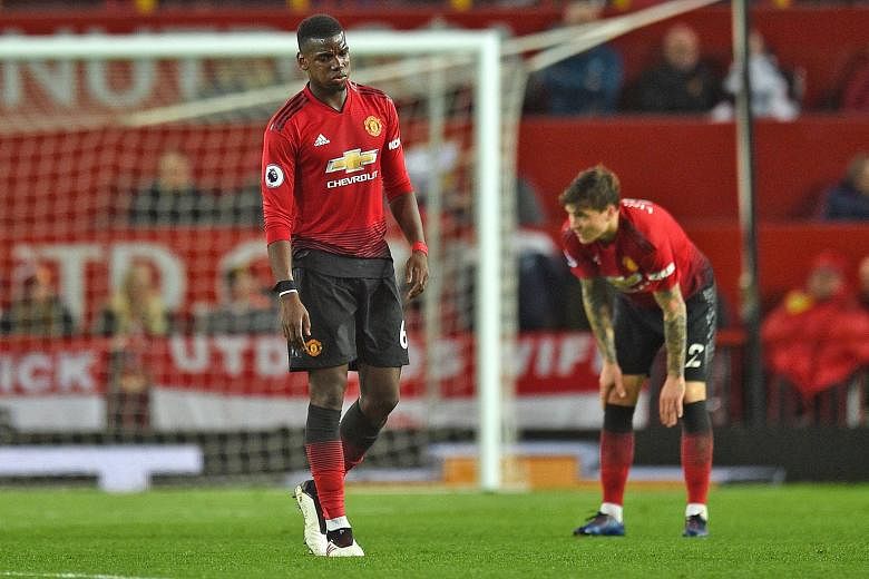 Midfielder Paul Pogba (left), defender Victor Lindelof and their Manchester United teammates could not handle Manchester City in the second half of their 2-0 Premier League derby defeat on Wednesday. There has been speculation over the future of club