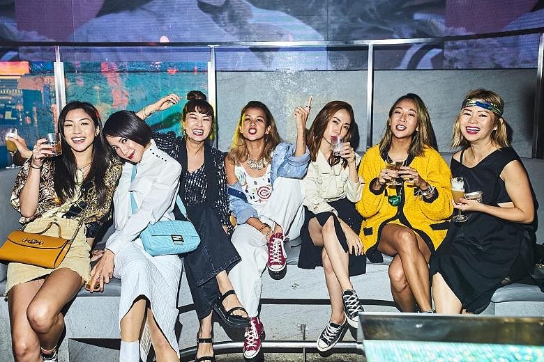 (From left) Singer Narelle Kheng, actress Fiona Xie, creative consultant Tracy Phillips, eco advocate and creative consultant Aarika Lee, entrepreneur Jaime Lee, branding agency co-founder Charmaine Seah and DJ Ginette Chittick at Female's 45th-anniversar
