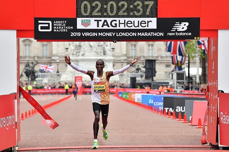 Kenya's Eliud Kipchoge, 34, crossing the finish line in 2hr 2min 37sec to win his fourth London Marathon yesterday.