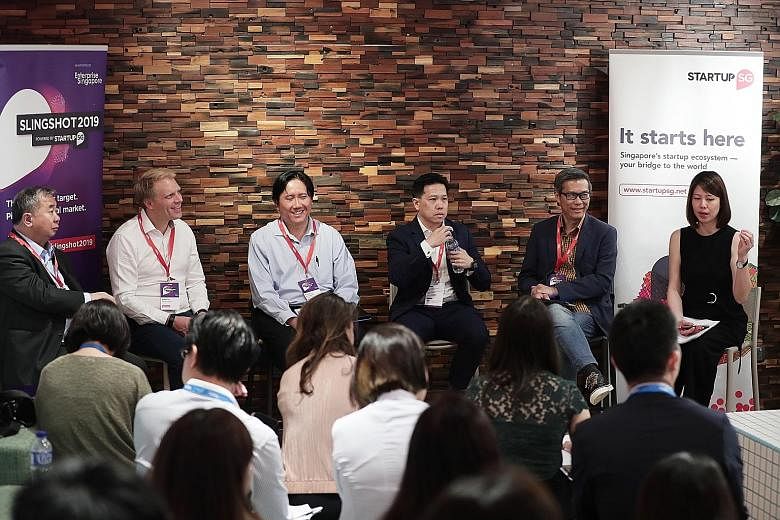 An industry panel at last Friday's media briefing comprising (from left) National University of Singapore deputy president of innovation and enterprise Freddy Boey, Antler chief executive and founder Magnus Grimeland, Enterprise Singapore assistant C