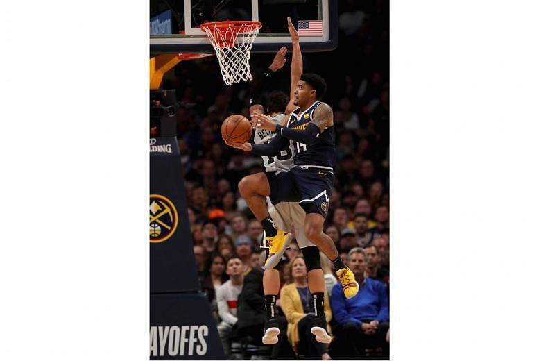 Denver Nuggets' Gary Harris going for the basket in their NBA play-off first-round game against the San Antonio Spurs on Saturday. The Nuggets won 90-86 to advance to the Western Conference semi-finals.