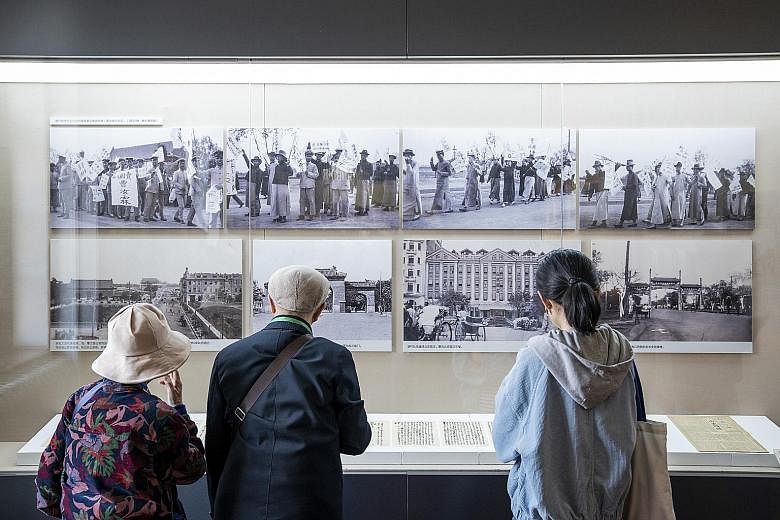Visitors at an exhibition, "A Panorama of the May Fourth Movement", in the New Culture Movement Memorial Museum in Beijing last Friday.