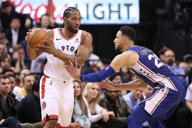 Ben Simmons and the Philadelphia 76ers working hard to contain Toronto Raptors ace Kawhi Leonard in their NBA Eastern Conference semi-final series on Monday. The 76ers won 94-89 to tie the series at 1-1.