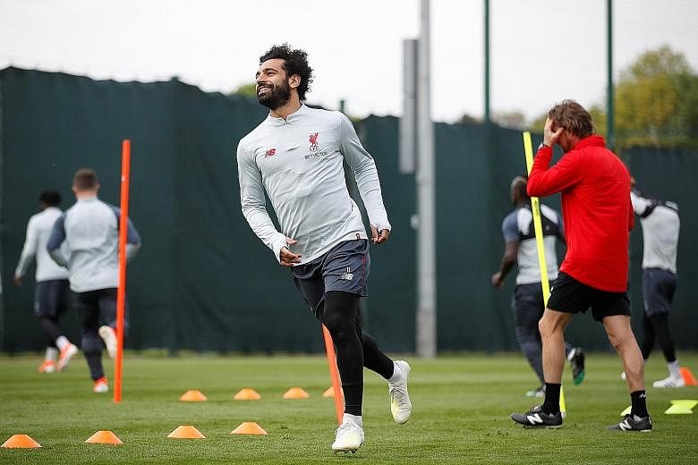 Liverpool's Mohamed Salah can count on his defensive teammates Trent Alexander-Arnold and Andrew Robertson to bomb forward against Barcelona in hope of chipping in with assists and goals.