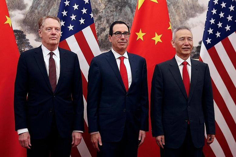 (From left) US Trade Representative Robert Lighthizer, US Treasury Secretary Steven Mnuchin and Chinese Vice-Premier Liu He before their meeting at the Diaoyutai state guesthouse in Beijing yesterday.