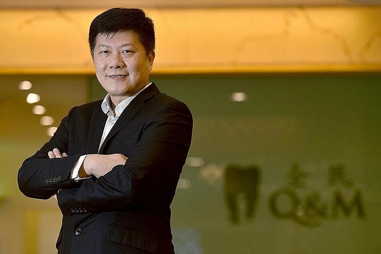 Dr Ng Chin Siau, chief executive of Q&M Dental Group, plans to help grow the future generations of dentists. "We are forming the first private dental college in Singapore... It targets graduate dentists who will get an additional diploma from us," he