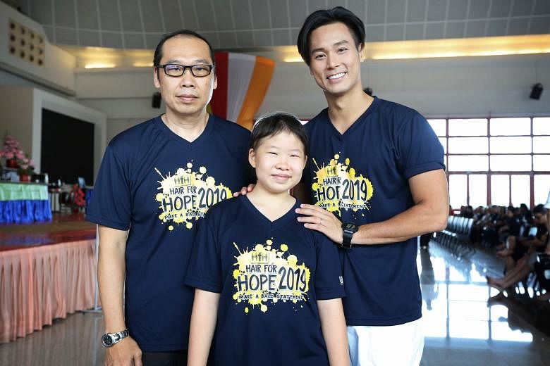 Right: Mr Chong Hui Kwee (left of image), his daughter Joanna and local actor Andie Chen, one of this year's Hair for Hope ambassadors. Far right: Mr Chong and his daughter getting their heads shaved as part of Hair for Hope at Kong Meng San Phor Kar